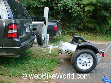 How do you mount a motorcycle tow-behind trailer?