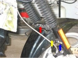 Front forks and front brake line on BMW motorcycle