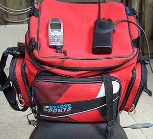 Autocom transceiver and cell phone in tank bag