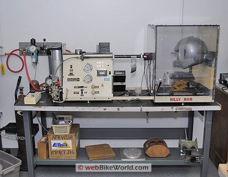 An impact testing machine for motorcycle helmet visors