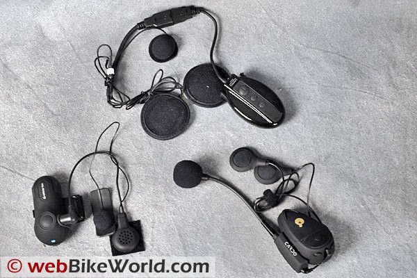 Clockwise from top: IMC Camos; Cardo Scala Rider TeamSet; Interphone