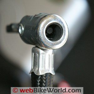 The plastic and metal tire stem valve used on the Slime compressor is low quality (R).