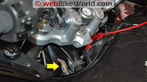 Arrow indicates the wiring harness in the Multistrada.