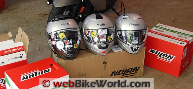 Three Nolan Helmets