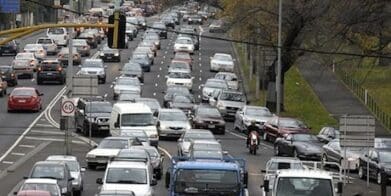 Bike lanes lane filtering ride to work tax congestion