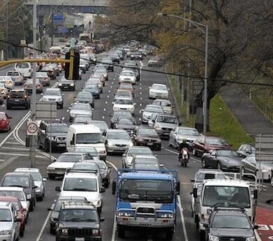 Bike lanes lane filtering ride to work tax congestion