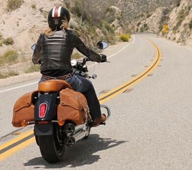 Indian Scout with brown leather saddlebags and pillions seat