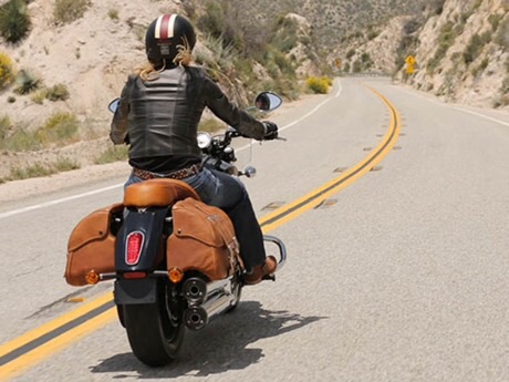 Indian Scout with brown leather saddlebags and pillions seat