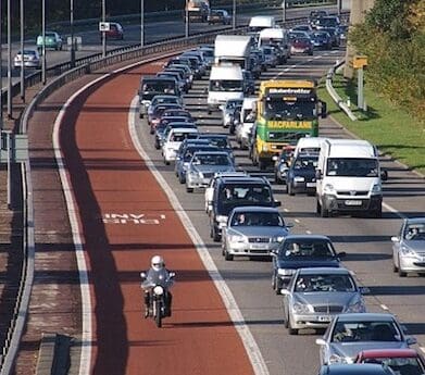 Bus Lane rider - helmet cam - lane filtering tinted visor