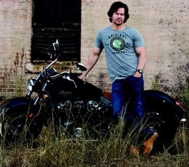 Mark Wahlberg with in an Indian t-shirt with an Indian Scout