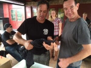 David prepares a hydration vest for Matho