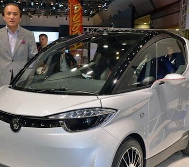Yamaha president Hiroyuki Yanagi with 2013 commuter car concept