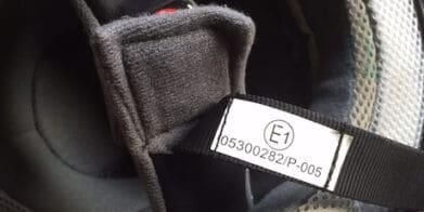 E1 helmet compliance label