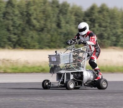 Matt McKeown (Plymouth) on his jet powered shopping trolley set an unofficial world record of 61.18mph (photo Steve McDonald) wheelie