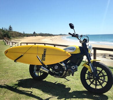 Ducati Scrambler with surfboard from Motolife Caloundra