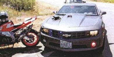 Police Camaro rams motorcycle