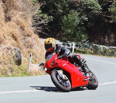 Riders on Mt Glorious road works designer straight