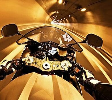 Blip the throttle in a tunnel rhythm