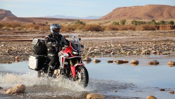 Laura Csortan and Christophe Barriere-Varju in "Riding Morocco: Chasing the Dakar” on TV