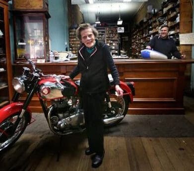 Mrs Beanham in her Modak Motorcycles shop Rally to honour motorcycle shop icon