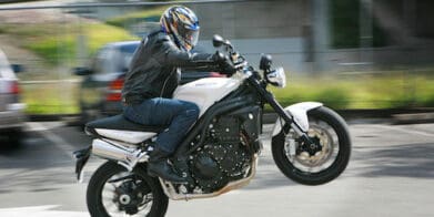 MBW does a wheelie in a private carpark Triumph Street Triple mojo