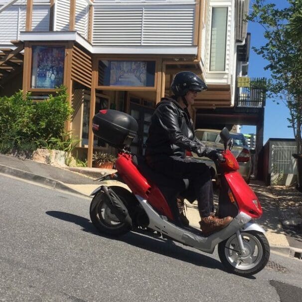 David Hinchliffe and his SYM scooter - Former politician regrets rider support