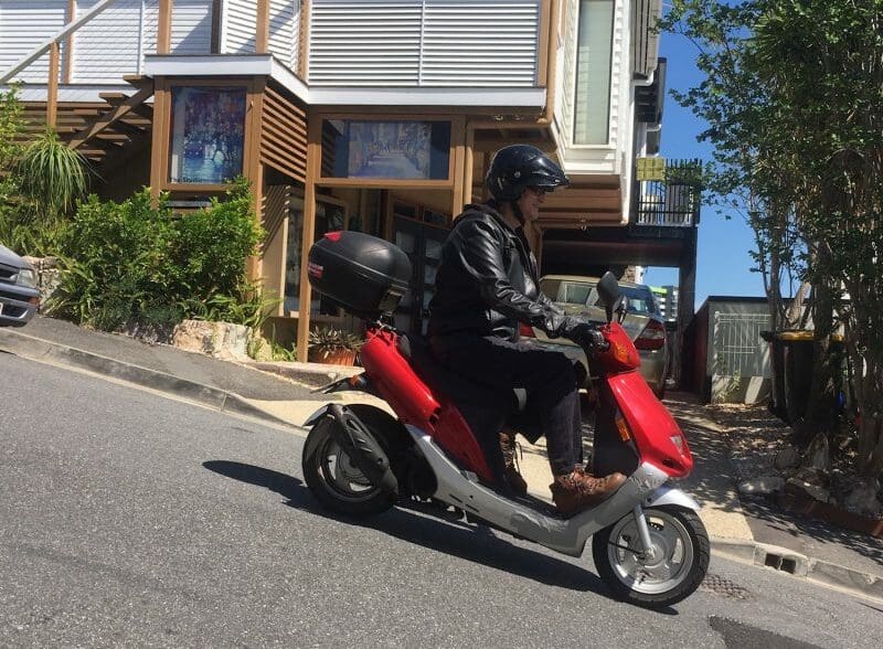 David Hinchliffe and his SYM scooter - Former politician regrets rider support