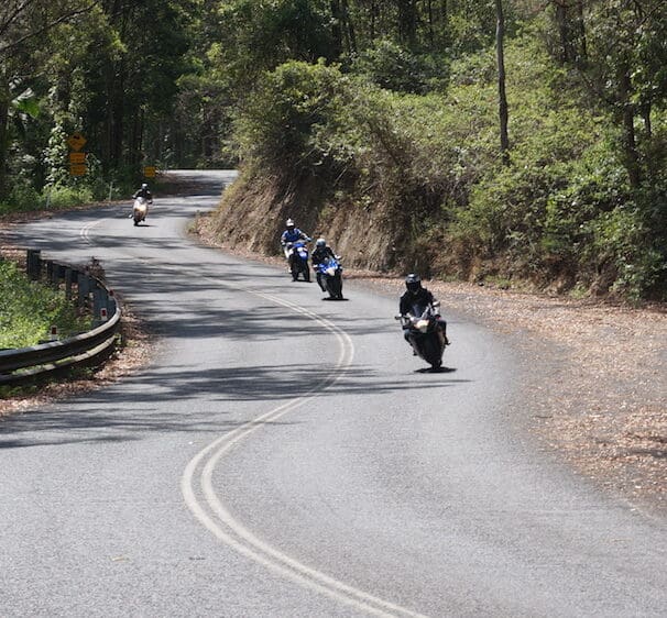 Wide entry, late apex safest on-road Downhill corners most dangerous