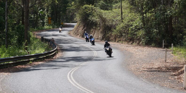 Wide entry, late apex safest on-road Downhill corners most dangerous