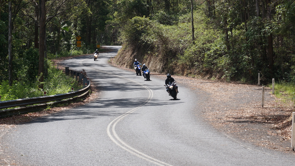Wide entry, late apex safest on-road Downhill corners most dangerous