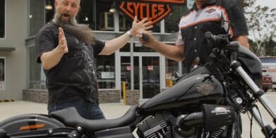 Garry "Gaz" Luxmoore hands over the keys to a Low Rider S to surprised winner Brett Humphries