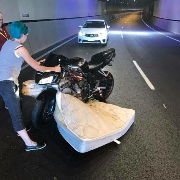 Rider hits unsecured mattress in tunnel