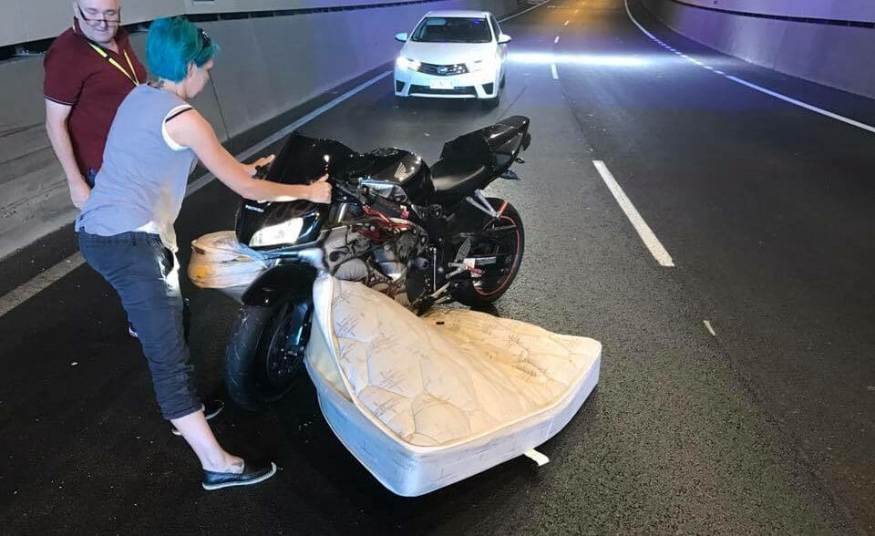 Rider hits unsecured mattress in tunnel