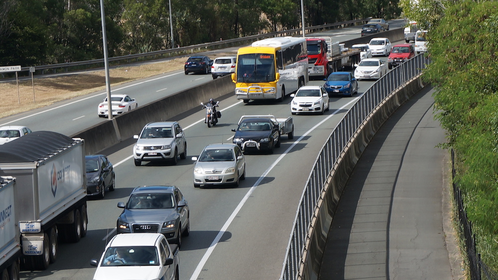 How to ride safely in heavy traffic lane filtering peeved commuters lip automatic brakes