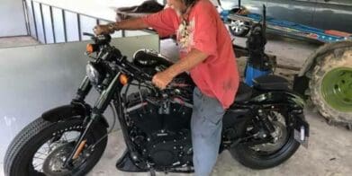 Scruffy customer buys Harley with cash