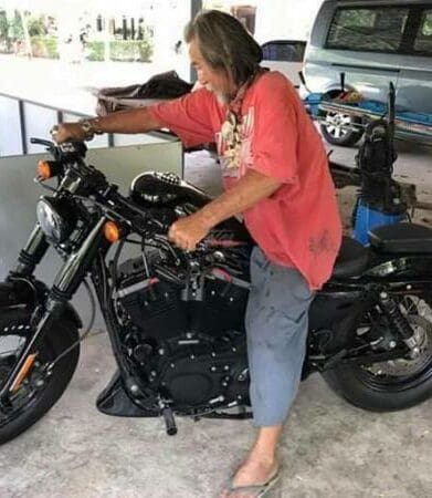 Scruffy customer buys Harley with cash