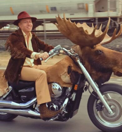 Macklemore on his Moosercycle