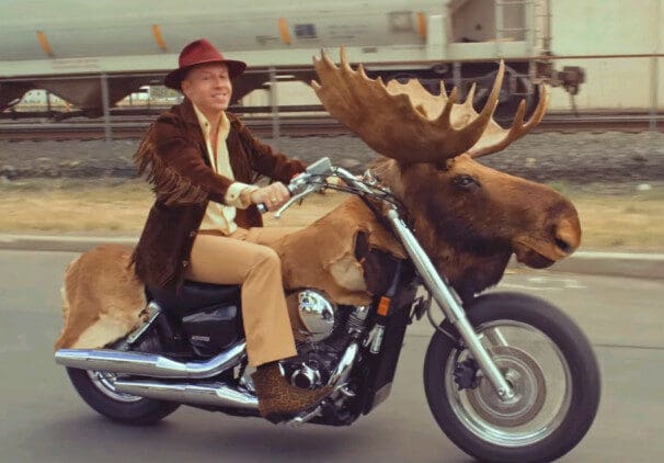 Macklemore on his Moosercycle