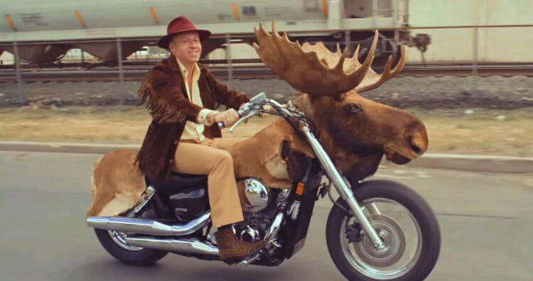Macklemore on his Moosercycle