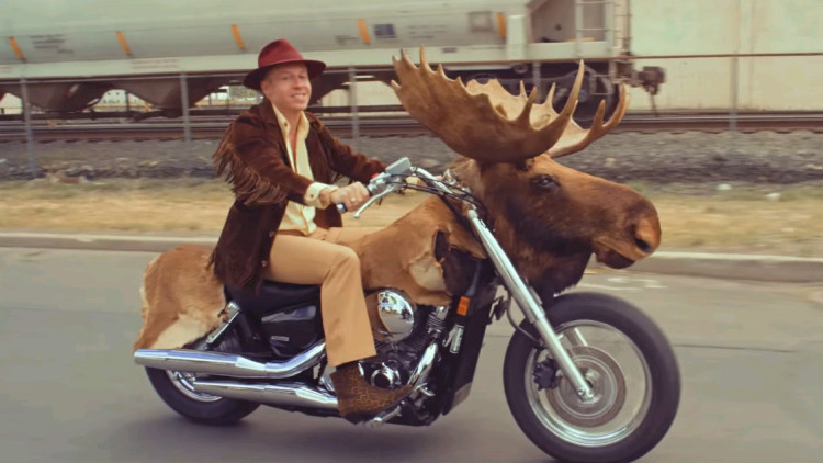 Macklemore on his Moosercycle