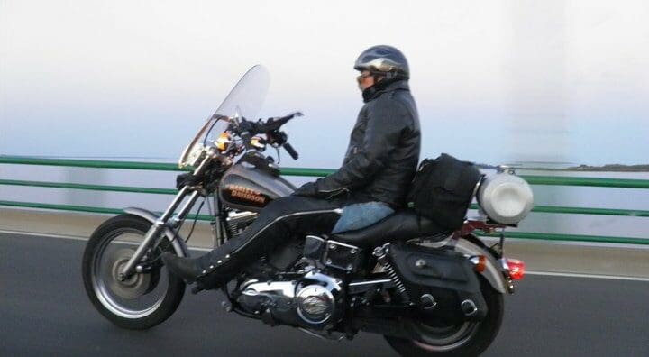 Michigan rider Phil Comar, known as the No Hands Man, has set a new world record for riding 600 miles without touching the handlebars.