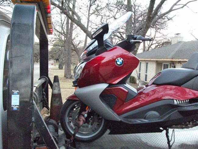 BMW Scooter on Two Truck Front