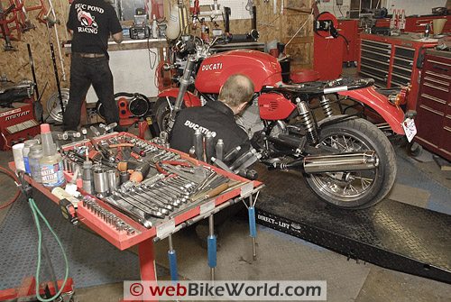 Donnie Unger, Duc Pond Motosports, working on the bike.