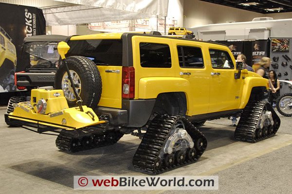 How about a Hummer snow vehicle, with...what the heck is that on the back?