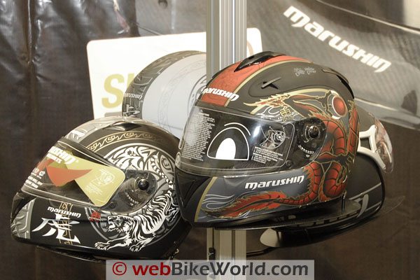 Some Marushin full-face helmets with Japanese-inspired graphics.