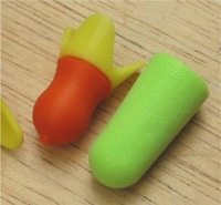 Heartech earplug size compared to a Purafit 6800 disposable earplug.