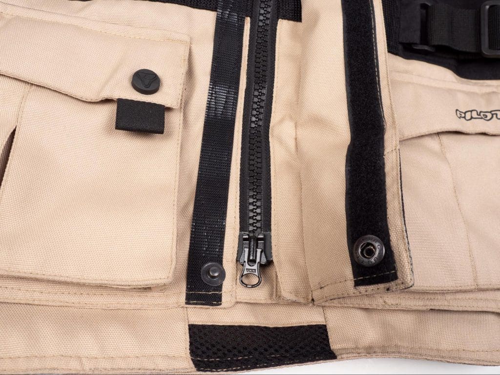 Pilot Motosport Elipsol Air Closeup of Bottom Zipper And Button Clasp