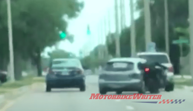 Road rage driver slams into rider