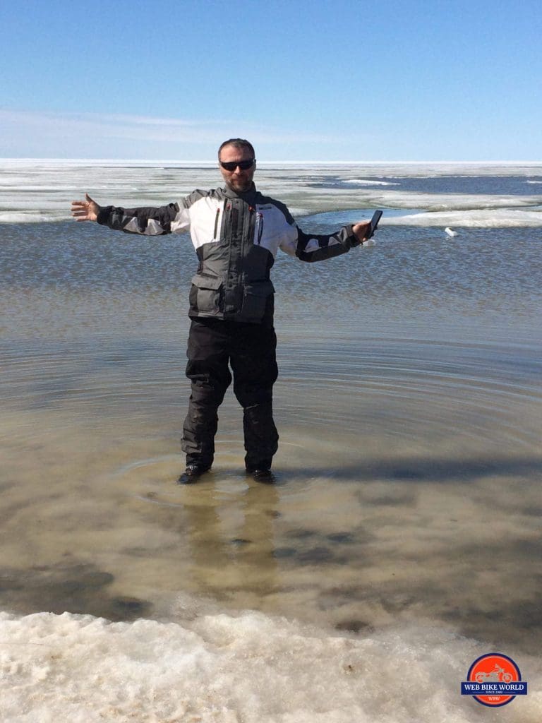 In Tuktoyaktuk wearing Joe Rocket Canada and Sidi riding gear in the Arctic Ocean.