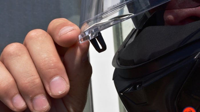 The unnecessary locking tab on the AGV Sportmodular Carbon visor.